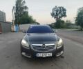 Серый Опель Инсигния, объемом двигателя 2 л и пробегом 410 тыс. км за 7500 $, фото 1 на Automoto.ua