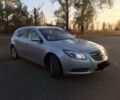 Серый Опель Инсигния, объемом двигателя 2 л и пробегом 177 тыс. км за 10500 $, фото 1 на Automoto.ua