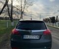 Серый Опель Инсигния, объемом двигателя 2 л и пробегом 297 тыс. км за 6500 $, фото 2 на Automoto.ua