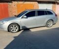 Серый Опель Инсигния, объемом двигателя 1.96 л и пробегом 257 тыс. км за 6850 $, фото 2 на Automoto.ua