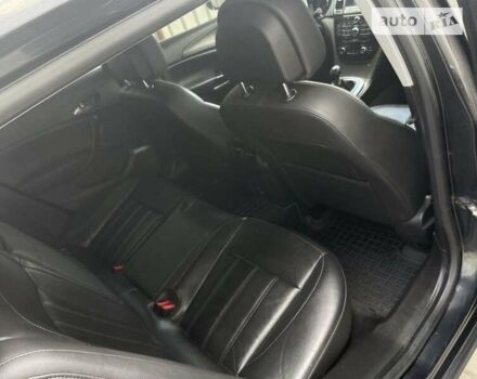 Сірий Опель Інсігнія, об'ємом двигуна 1.96 л та пробігом 217 тис. км за 7499 $, фото 8 на Automoto.ua