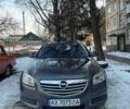 Серый Опель Инсигния, объемом двигателя 1.96 л и пробегом 284 тыс. км за 8000 $, фото 1 на Automoto.ua