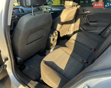 Серый Опель Инсигния, объемом двигателя 2 л и пробегом 323 тыс. км за 6900 $, фото 12 на Automoto.ua