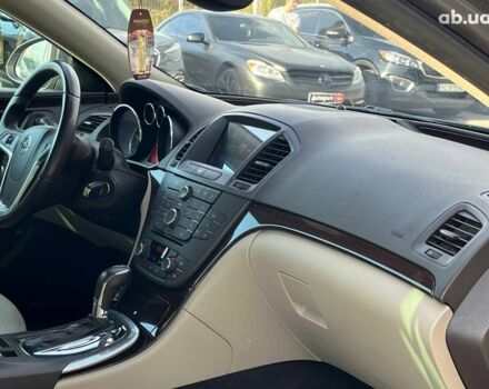 Серый Опель Инсигния, объемом двигателя 2 л и пробегом 213 тыс. км за 9990 $, фото 6 на Automoto.ua