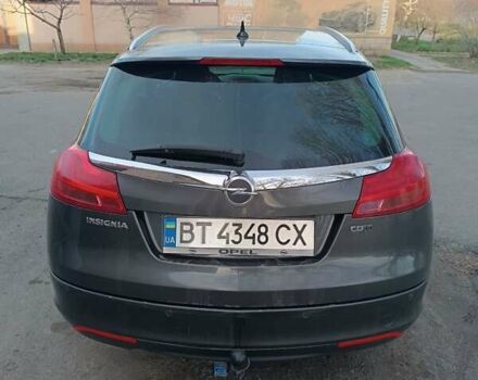 Сірий Опель Інсігнія, об'ємом двигуна 1.96 л та пробігом 240 тис. км за 7600 $, фото 2 на Automoto.ua