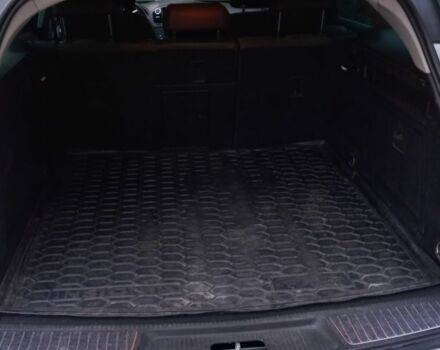 Серый Опель Инсигния, объемом двигателя 2 л и пробегом 219 тыс. км за 8199 $, фото 4 на Automoto.ua