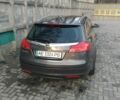 Сірий Опель Інсігнія, об'ємом двигуна 2 л та пробігом 318 тис. км за 7800 $, фото 2 на Automoto.ua