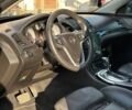 Сірий Опель Інсігнія, об'ємом двигуна 2 л та пробігом 210 тис. км за 7100 $, фото 4 на Automoto.ua