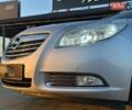 Сірий Опель Інсігнія, об'ємом двигуна 2 л та пробігом 325 тис. км за 7300 $, фото 4 на Automoto.ua