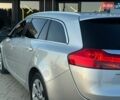 Серый Опель Инсигния, объемом двигателя 2 л и пробегом 325 тыс. км за 6600 $, фото 16 на Automoto.ua