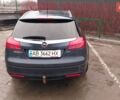 Серый Опель Инсигния, объемом двигателя 2 л и пробегом 260 тыс. км за 9900 $, фото 2 на Automoto.ua