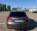 Сірий Опель Інсігнія, об'ємом двигуна 2 л та пробігом 310 тис. км за 6500 $, фото 4 на Automoto.ua