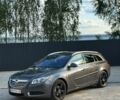Сірий Опель Інсігнія, об'ємом двигуна 2 л та пробігом 210 тис. км за 7100 $, фото 5 на Automoto.ua