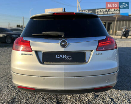 Серый Опель Инсигния, объемом двигателя 2 л и пробегом 323 тыс. км за 6900 $, фото 5 на Automoto.ua