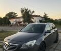 Серый Опель Инсигния, объемом двигателя 2 л и пробегом 264 тыс. км за 8999 $, фото 1 на Automoto.ua