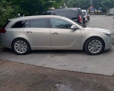 Серый Опель Инсигния, объемом двигателя 1.96 л и пробегом 264 тыс. км за 9500 $, фото 2 на Automoto.ua