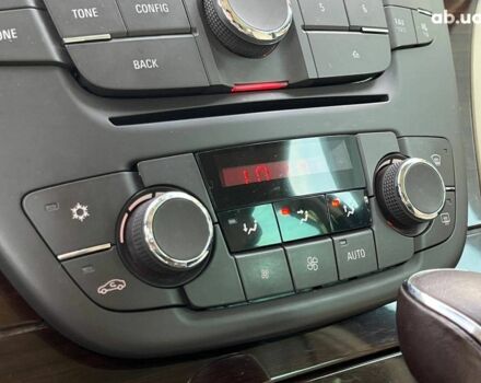 Серый Опель Инсигния, объемом двигателя 2 л и пробегом 213 тыс. км за 9990 $, фото 26 на Automoto.ua