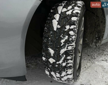 Серый Опель Инсигния, объемом двигателя 2 л и пробегом 219 тыс. км за 7650 $, фото 98 на Automoto.ua