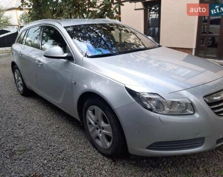 Серый Опель Инсигния, объемом двигателя 2 л и пробегом 234 тыс. км за 8300 $, фото 2 на Automoto.ua