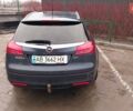 Серый Опель Инсигния, объемом двигателя 2 л и пробегом 260 тыс. км за 9900 $, фото 2 на Automoto.ua