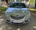 Сірий Опель Інсігнія, об'ємом двигуна 1.96 л та пробігом 310 тис. км за 6799 $, фото 1 на Automoto.ua