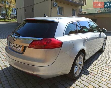 Серый Опель Инсигния, объемом двигателя 2 л и пробегом 237 тыс. км за 10199 $, фото 4 на Automoto.ua