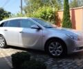 Серый Опель Инсигния, объемом двигателя 2 л и пробегом 179 тыс. км за 10450 $, фото 6 на Automoto.ua