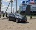 Серый Опель Инсигния, объемом двигателя 1.96 л и пробегом 225 тыс. км за 9950 $, фото 1 на Automoto.ua