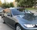 Серый Опель Инсигния, объемом двигателя 1.96 л и пробегом 234 тыс. км за 8350 $, фото 3 на Automoto.ua