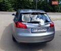 Серый Опель Инсигния, объемом двигателя 1.4 л и пробегом 120 тыс. км за 8500 $, фото 3 на Automoto.ua