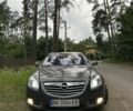 Сірий Опель Інсігнія, об'ємом двигуна 2 л та пробігом 250 тис. км за 7671 $, фото 1 на Automoto.ua
