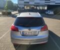Серый Опель Инсигния, объемом двигателя 2 л и пробегом 240 тыс. км за 7499 $, фото 4 на Automoto.ua