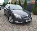 Серый Опель Инсигния, объемом двигателя 2 л и пробегом 293 тыс. км за 9500 $, фото 1 на Automoto.ua