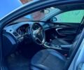 Серый Опель Инсигния, объемом двигателя 2 л и пробегом 247 тыс. км за 8000 $, фото 6 на Automoto.ua