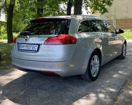 Сірий Опель Інсігнія, об'ємом двигуна 1.96 л та пробігом 310 тис. км за 6799 $, фото 5 на Automoto.ua