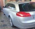 Сірий Опель Інсігнія, об'ємом двигуна 2 л та пробігом 260 тис. км за 7000 $, фото 4 на Automoto.ua