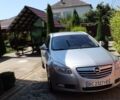 Серый Опель Инсигния, объемом двигателя 2 л и пробегом 179 тыс. км за 10450 $, фото 1 на Automoto.ua