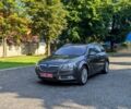 Серый Опель Инсигния, объемом двигателя 2 л и пробегом 220 тыс. км за 10550 $, фото 1 на Automoto.ua