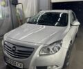 Сірий Опель Інсігнія, об'ємом двигуна 2 л та пробігом 300 тис. км за 7000 $, фото 1 на Automoto.ua