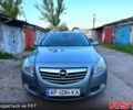 Серый Опель Инсигния, объемом двигателя 2 л и пробегом 247 тыс. км за 8000 $, фото 1 на Automoto.ua
