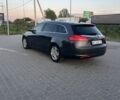 Серый Опель Инсигния, объемом двигателя 2 л и пробегом 299 тыс. км за 7600 $, фото 4 на Automoto.ua