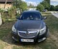 Сірий Опель Інсігнія, об'ємом двигуна 2 л та пробігом 300 тис. км за 6483 $, фото 1 на Automoto.ua