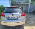 Сірий Опель Інсігнія, об'ємом двигуна 2 л та пробігом 220 тис. км за 6473 $, фото 4 на Automoto.ua