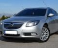 Серый Опель Инсигния, объемом двигателя 2 л и пробегом 190 тыс. км за 12800 $, фото 1 на Automoto.ua