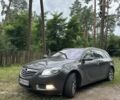 Сірий Опель Інсігнія, об'ємом двигуна 2 л та пробігом 250 тис. км за 7671 $, фото 4 на Automoto.ua