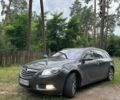 Серый Опель Инсигния, объемом двигателя 1.96 л и пробегом 256 тыс. км за 7700 $, фото 1 на Automoto.ua