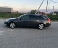 Серый Опель Инсигния, объемом двигателя 2 л и пробегом 299 тыс. км за 7700 $, фото 1 на Automoto.ua