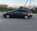 Серый Опель Инсигния, объемом двигателя 2 л и пробегом 299 тыс. км за 7600 $, фото 1 на Automoto.ua