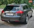 Серый Опель Инсигния, объемом двигателя 1.96 л и пробегом 226 тыс. км за 9950 $, фото 6 на Automoto.ua