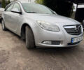 Серый Опель Инсигния, объемом двигателя 1.96 л и пробегом 234 тыс. км за 7700 $, фото 1 на Automoto.ua